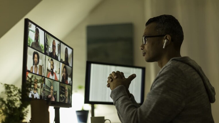 man using online meeting tool