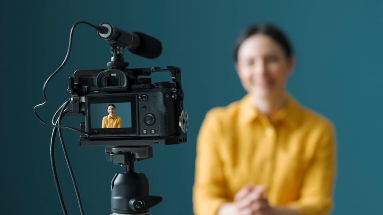 woman in front of the camera