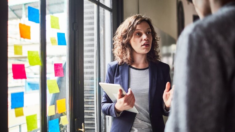 Woman presenting crisis communication plan